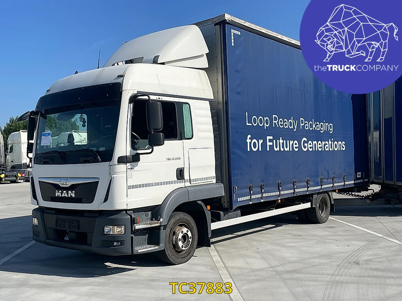 MAN TGL 220 - Camión lona: foto 1 MAN TGL 220 - Camión lona: foto 1