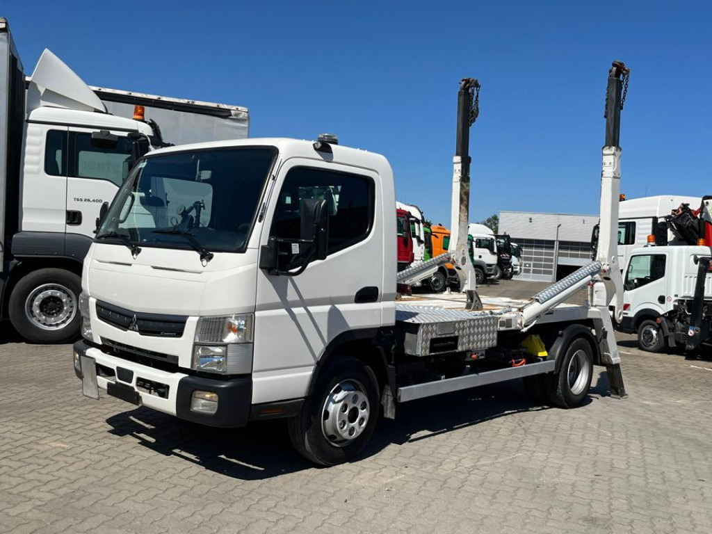 MITSUBISHI (J) Canter Fuso 7C18 Absetzkipper Tele verbreiterbar - Camión portacontenedor de cadenas: foto 1 MITSUBISHI (J) Canter Fuso 7C18 Absetzkipper Tele verbreiterbar - Camión portacontenedor de cadenas: foto 1
