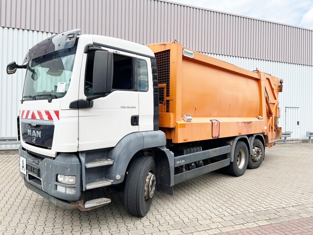 MAN TGS 26.320 6x2-4 BL TGS 26.320/400 6x2-4 BL, Lift-/Lenkachse, Heil PLK 21 M, Zöller-Schüttung - Camión de basura: foto 1 MAN TGS 26.320 6x2-4 BL TGS 26.320/400 6x2-4 BL, Lift-/Lenkachse, Heil PLK 21 M, Zöller-Schüttung - Camión de basura: foto 1