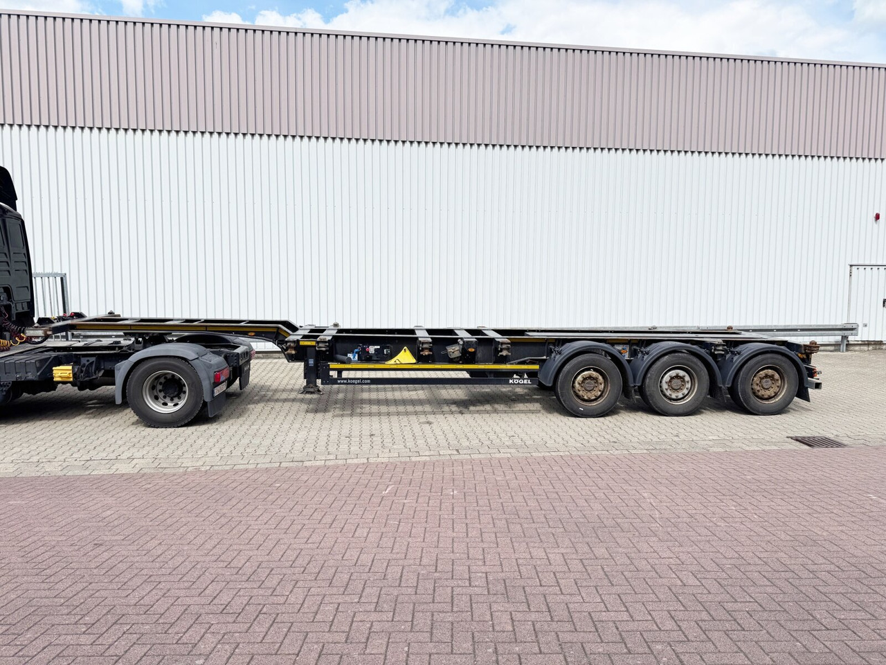 Kögel Port 45 Simplex Container-Chassis Port 45 Simplex, Container-Chassis, 20/2x20/30/40/45 Fuß, ausziehbar - Semirremolque: foto 1 Kögel Port 45 Simplex Container-Chassis Port 45 Simplex, Container-Chassis, 20/2x20/30/40/45 Fuß, ausziehbar - Semirremolque: foto 1
