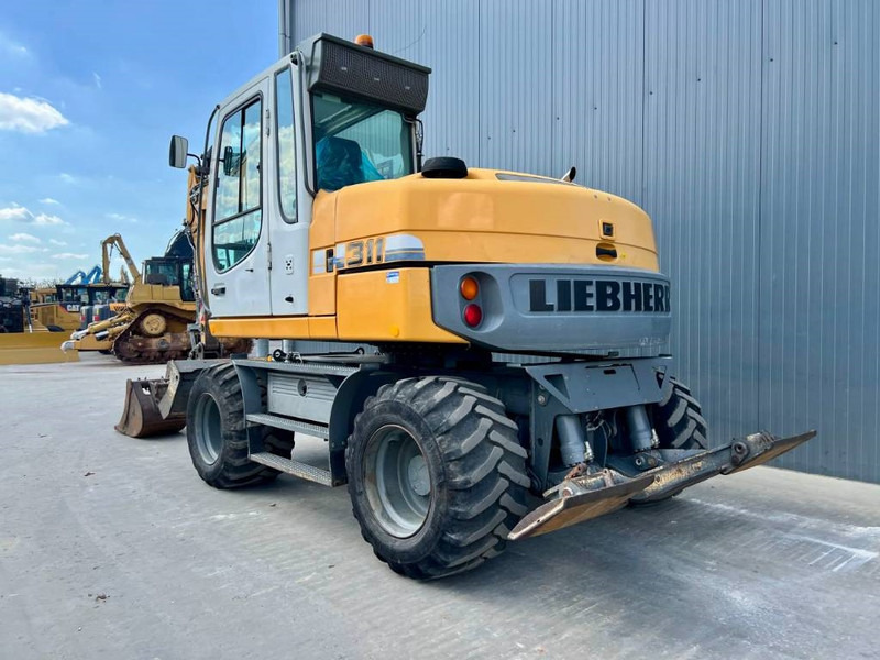Liebherr A311 Litronic - Excavadora de ruedas: foto 2 Liebherr A311 Litronic - Excavadora de ruedas: foto 2