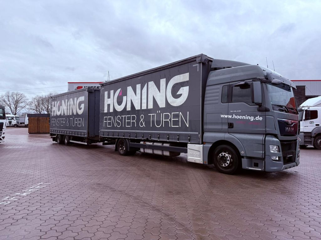 MAN TGX 18.440 LL Volumen LKW mit Staplerhalterung - Camión lona: foto 1 MAN TGX 18.440 LL Volumen LKW mit Staplerhalterung - Camión lona: foto 1