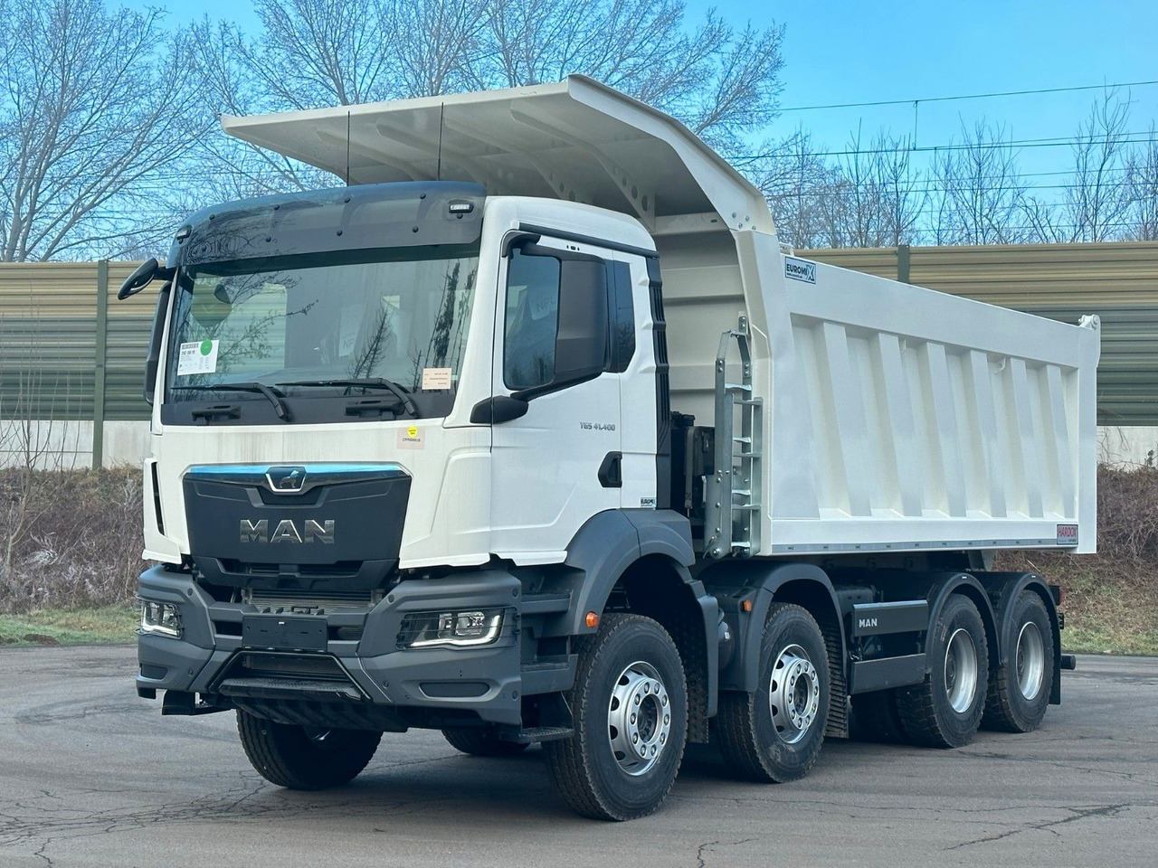 MAN TGS 41.400 8x4 / EUROMIX MTP 23m³/ Eckige Mulde - Camión volquete: foto 1 MAN TGS 41.400 8x4 / EUROMIX MTP 23m³/ Eckige Mulde - Camión volquete: foto 1