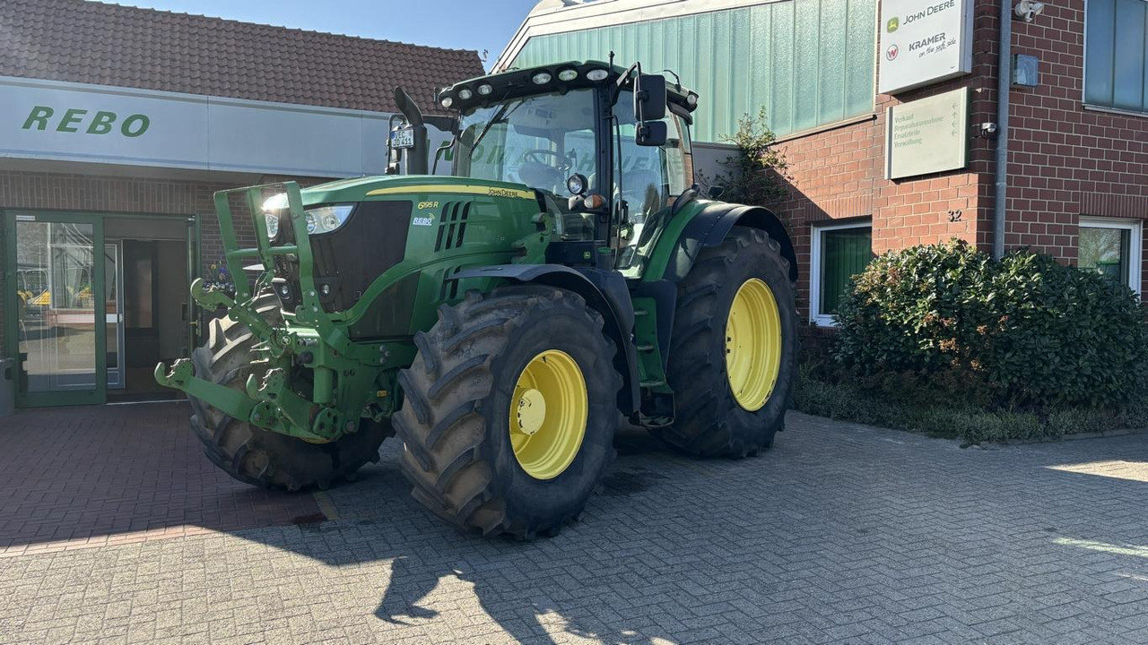 John Deere 6195 R - Tractor: foto 1 John Deere 6195 R - Tractor: foto 1