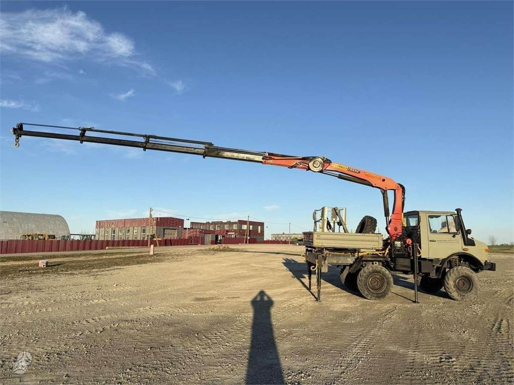 Mercedes-Benz Unimog Palfinger PK 12000 18 m 6.8 t Radio - Camión volquete: foto 1 Mercedes-Benz Unimog Palfinger PK 12000 18 m 6.8 t Radio - Camión volquete: foto 1