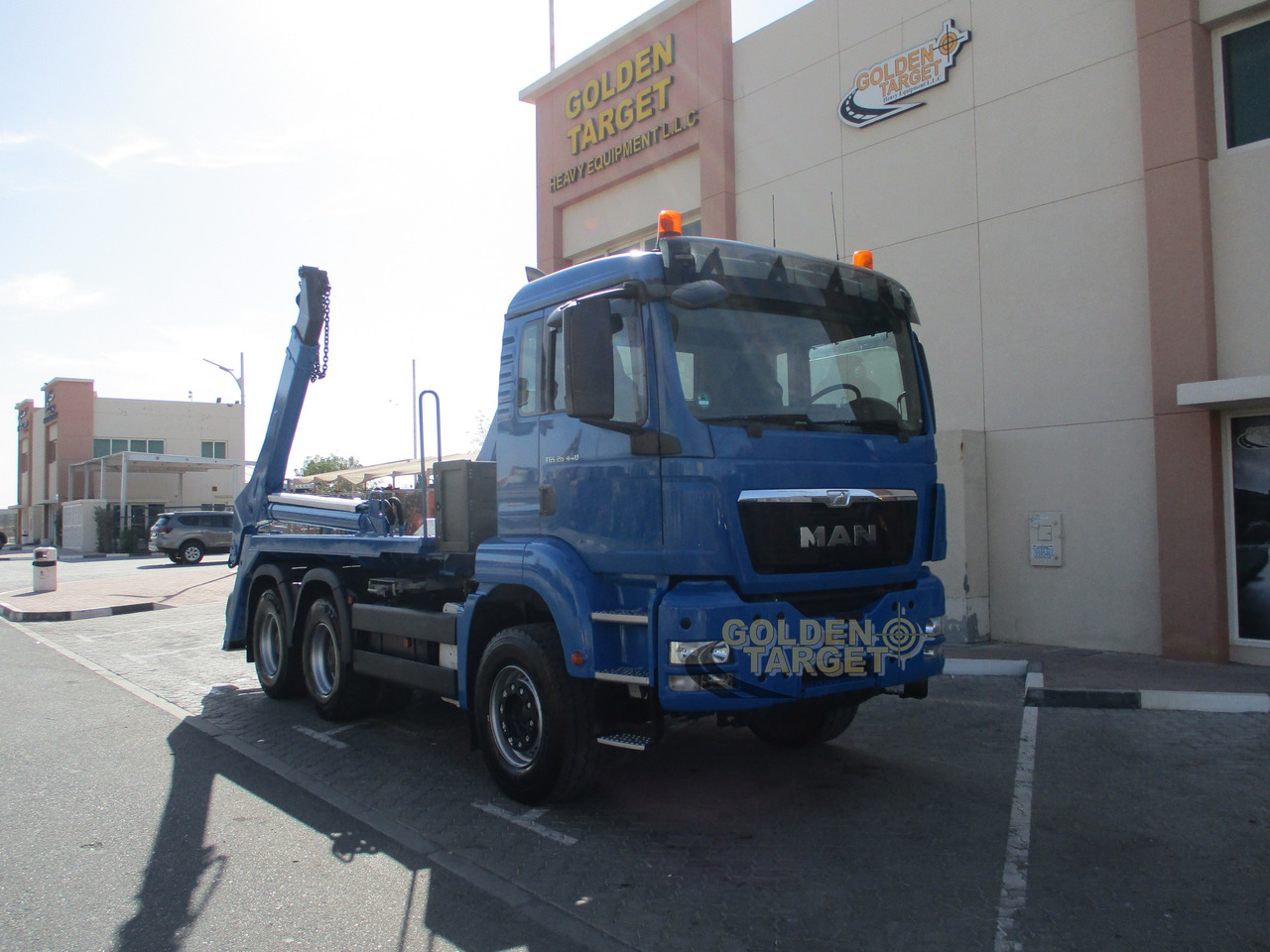 MAN TGS 26.440 6x4 Skip Loader - Camión portacontenedor de cadenas: foto 1 MAN TGS 26.440 6x4 Skip Loader - Camión portacontenedor de cadenas: foto 1