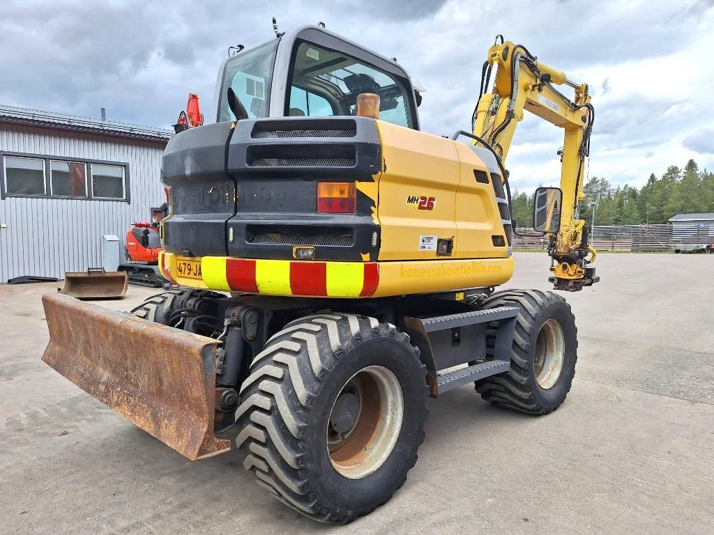 New Holland MH2.6 ENGCON PIHDEILLÄ - Excavadora de ruedas: foto 4 New Holland MH2.6 ENGCON PIHDEILLÄ - Excavadora de ruedas: foto 4