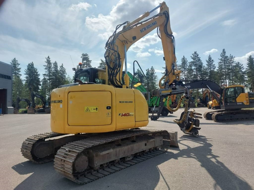New Holland MYYTY! SOLD! E140CSR MOTO - Excavadora de cadenas: foto 5 New Holland MYYTY! SOLD! E140CSR MOTO - Excavadora de cadenas: foto 5