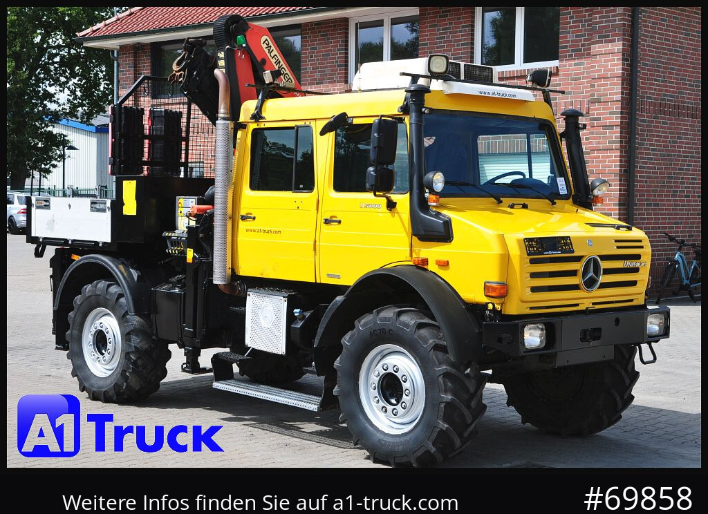 MERCEDES-BENZ Unimog U 5000 437/45 Kran Doka 6 Sitze - Camión grúa: foto 1 MERCEDES-BENZ Unimog U 5000 437/45 Kran Doka 6 Sitze - Camión grúa: foto 1