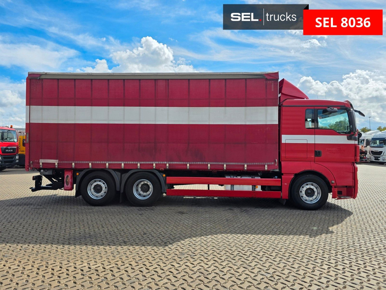 MAN TGX 26.360 6X2-2 LL / Intarder / Ldbw /Lenkachse - Camión lona: foto 4 MAN TGX 26.360 6X2-2 LL / Intarder / Ldbw /Lenkachse - Camión lona: foto 4