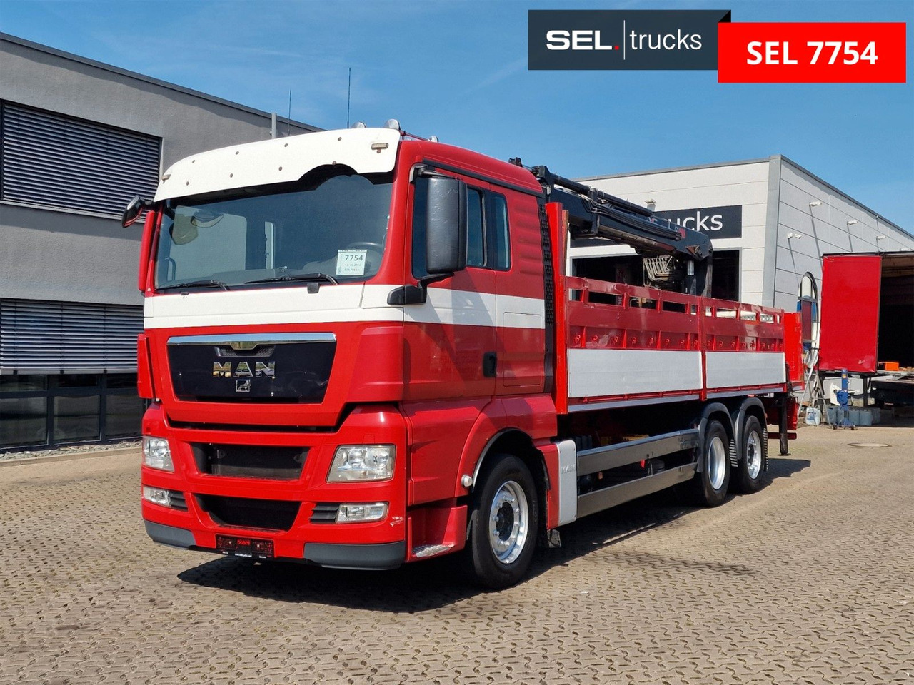 MAN TGX 26.400 6x2-2 BL/ Intarder / HIAB / Lenkachse - Camión grúa: foto 1 MAN TGX 26.400 6x2-2 BL/ Intarder / HIAB / Lenkachse - Camión grúa: foto 1