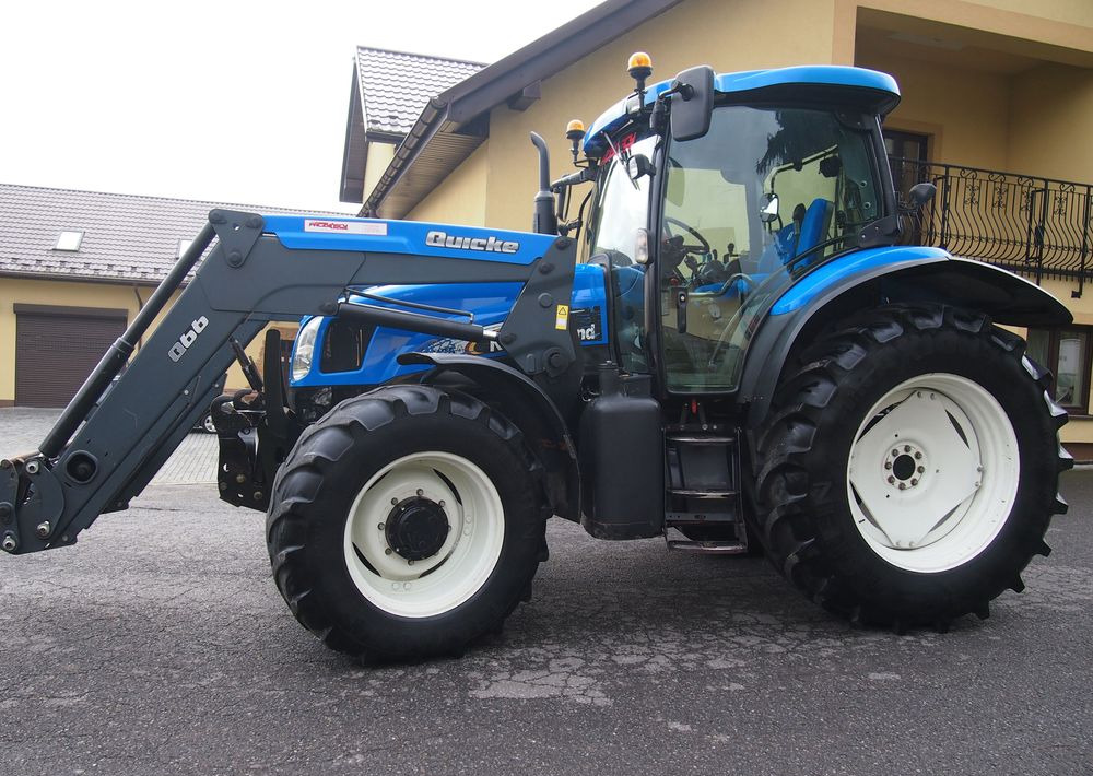 Ciągnik New Holland NH TS125A 6 cylindrów 2004 Ciągnik rolniczy New Holland TS125A - Tractor: foto 3 Ciągnik New Holland NH TS125A 6 cylindrów 2004 Ciągnik rolniczy New Holland TS125A - Tractor: foto 3