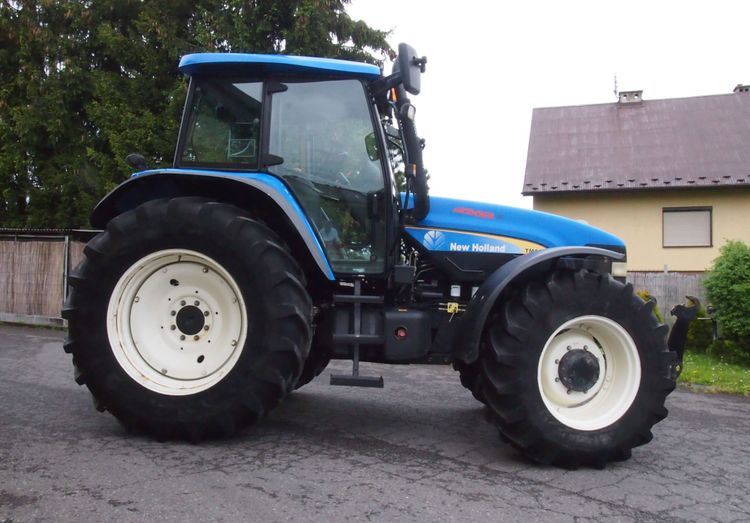 Ciągnik New Holland TM 140 2004 Przedni TUZ - Tractor: foto 4 Ciągnik New Holland TM 140 2004 Przedni TUZ - Tractor: foto 4