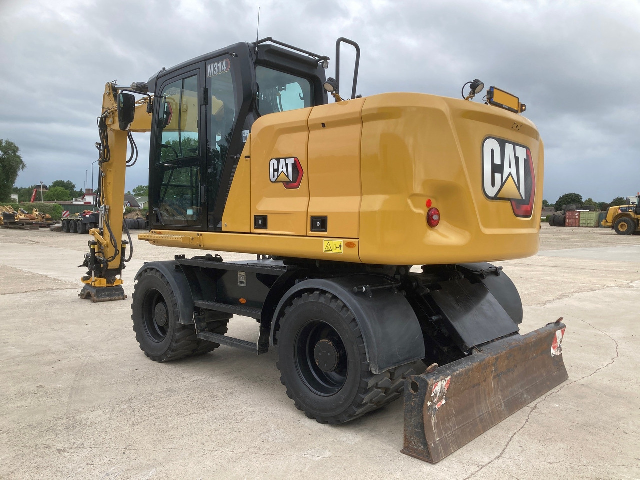 CATERPILLAR M314 - Excavadora de ruedas: foto 1 CATERPILLAR M314 - Excavadora de ruedas: foto 1