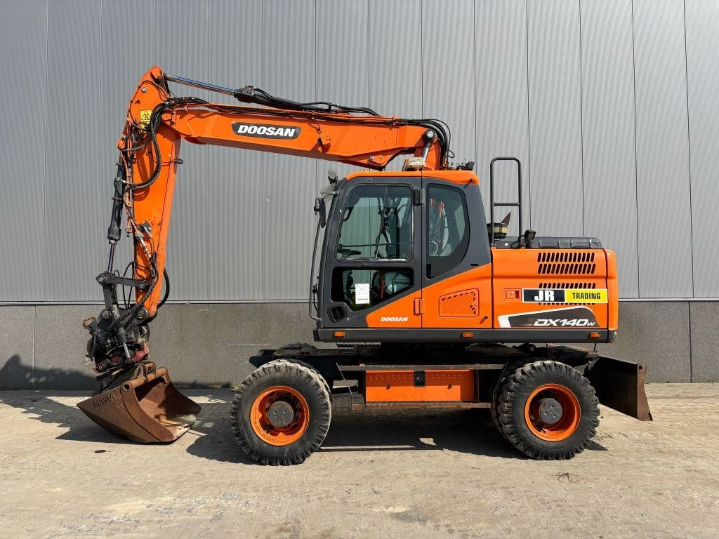 Doosan DX 140 W-5 (R5 Rototilt) - Excavadora de ruedas: foto 1 Doosan DX 140 W-5 (R5 Rototilt) - Excavadora de ruedas: foto 1
