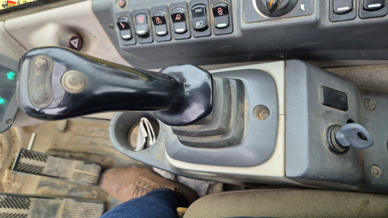 New Holland MH 2.6 Zustand gut, deutsche Maschine incl. Greifer und Dreservo - Excavadora de ruedas: foto 3 New Holland MH 2.6 Zustand gut, deutsche Maschine incl. Greifer und Dreservo - Excavadora de ruedas: foto 3