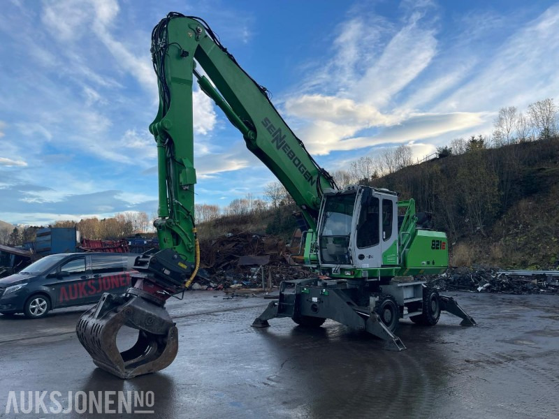 2015 Sennebogen 821M Hjulgraver med hevbar hytte, roterende sorterings klype, leveres med ny sertifisering - Excavadora: foto 1 2015 Sennebogen 821M Hjulgraver med hevbar hytte, roterende sorterings klype, leveres med ny sertifisering - Excavadora: foto 1