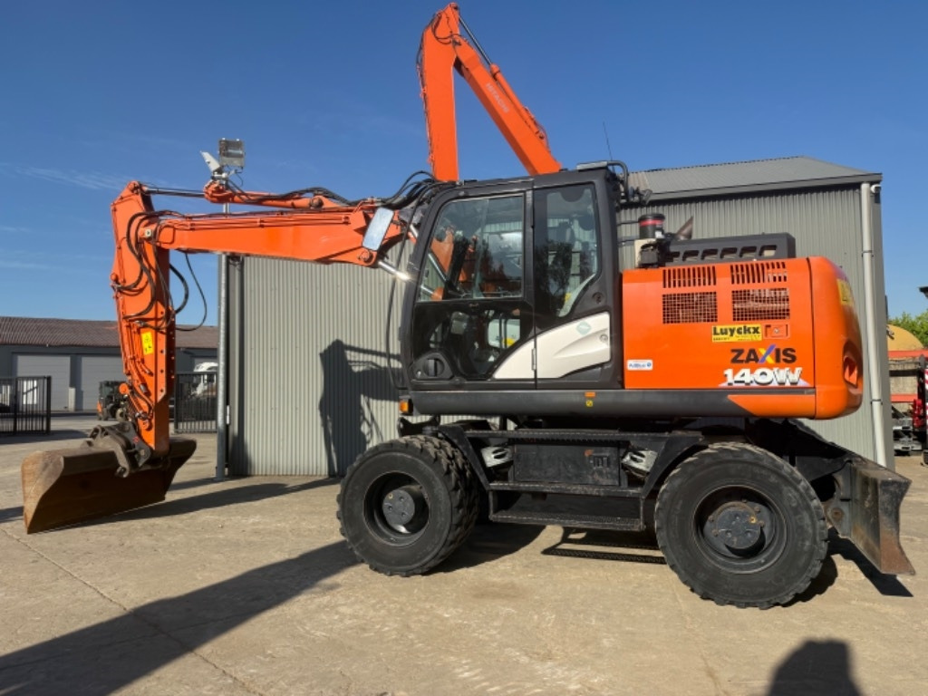 Hitachi ZX 140 WT-6 - Excavadora de ruedas: foto 1 Hitachi ZX 140 WT-6 - Excavadora de ruedas: foto 1