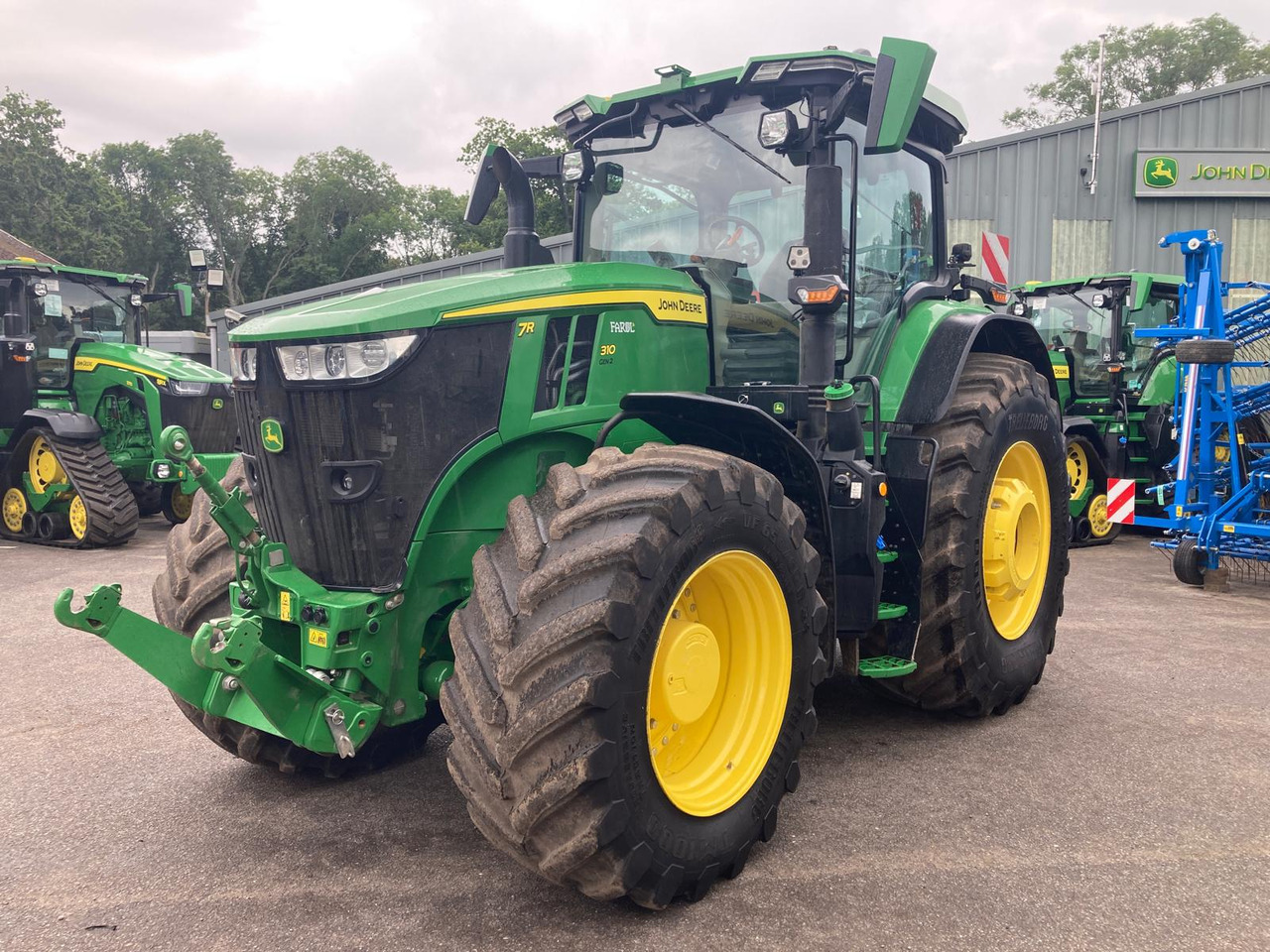 John Deere 7R 310 - Tractor: foto 1 John Deere 7R 310 - Tractor: foto 1