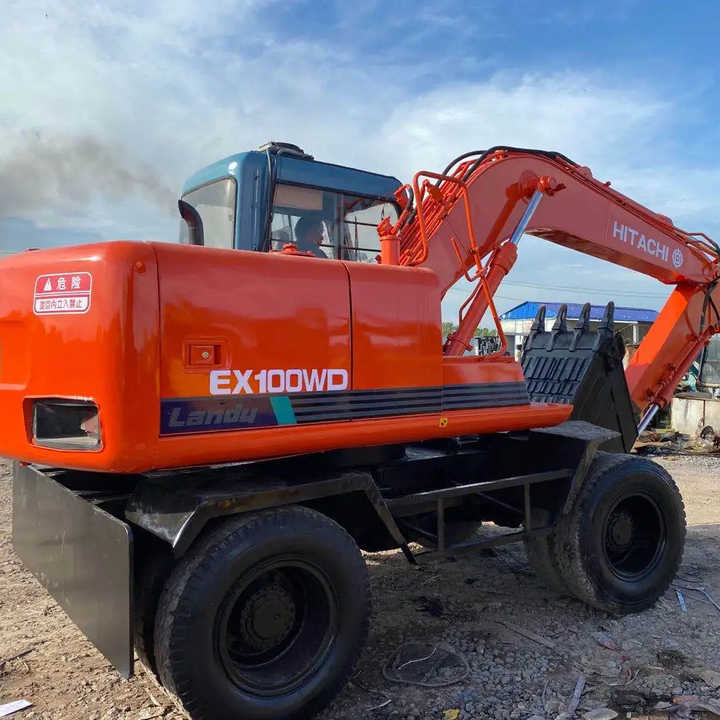 Used Hitachi Ex100WD Wheel Excavator for Sale Japan Made Hitachi Ex100wd Wheeled Excavator for Sale - Excavadora de cadenas: foto 1 Used Hitachi Ex100WD Wheel Excavator for Sale Japan Made Hitachi Ex100wd Wheeled Excavator for Sale - Excavadora de cadenas: foto 1