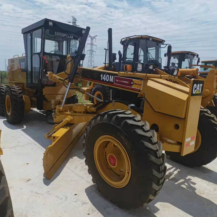 Used Japan Imported Caterpillar 140M Cat 140m Motor Grader with Good Quality and Low Price for Sale - Excavadora: foto 1 Used Japan Imported Caterpillar 140M Cat 140m Motor Grader with Good Quality and Low Price for Sale - Excavadora: foto 1