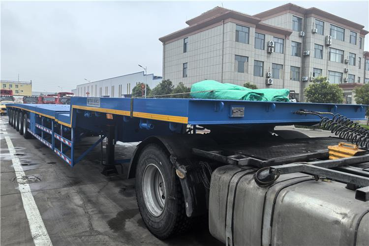 TITAN 6 Axle 54m Telescopic Flatbed Trailer for Sale In Angola - Semirremolque plataforma/ Caja abierta: foto 2 TITAN 6 Axle 54m Telescopic Flatbed Trailer for Sale In Angola - Semirremolque plataforma/ Caja abierta: foto 2