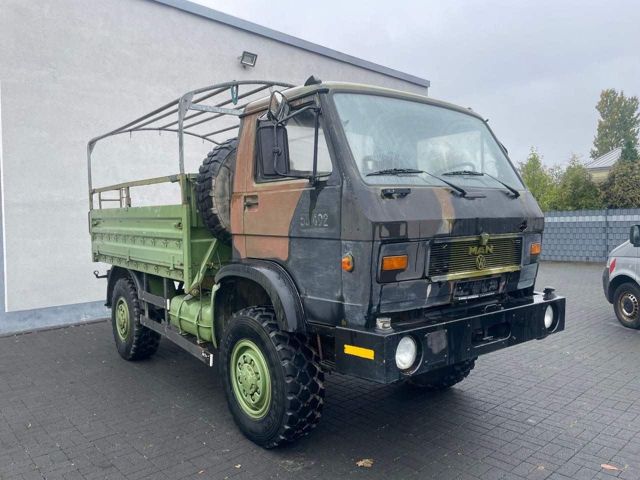 MAN 8.136 4X4 - Furgoneta caja abierta: foto 1 MAN 8.136 4X4 - Furgoneta caja abierta: foto 1