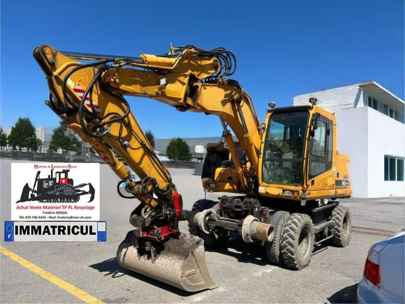 Hyundai ROBEX 140W-7 - Excavadora de ruedas: foto 1 Hyundai ROBEX 140W-7 - Excavadora de ruedas: foto 1