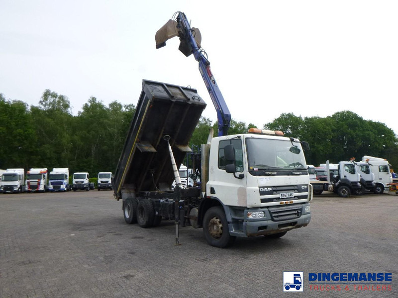 DAF CF 75.310 6x4 RHD tipper + HMF 1144 K-1 + grapple - Camión grúa: foto 2 DAF CF 75.310 6x4 RHD tipper + HMF 1144 K-1 + grapple - Camión grúa: foto 2