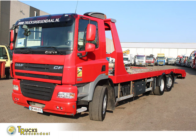 DAF CF 85.410 + EURO 5 + EXTENDABLE PLATFORM HYDROLIC + 6X2 + 3X IN STOCK / WINCH - Camión portavehículos: foto 1 DAF CF 85.410 + EURO 5 + EXTENDABLE PLATFORM HYDROLIC + 6X2 + 3X IN STOCK / WINCH - Camión portavehículos: foto 1