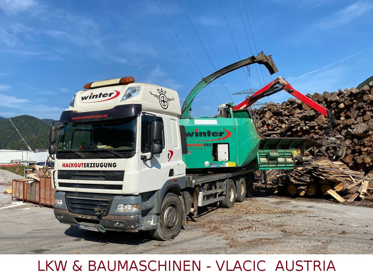 DAF CF85 Holzhackmaschine JENZ HEM 700 - Camión forestal: foto 1 DAF CF85 Holzhackmaschine JENZ HEM 700 - Camión forestal: foto 1