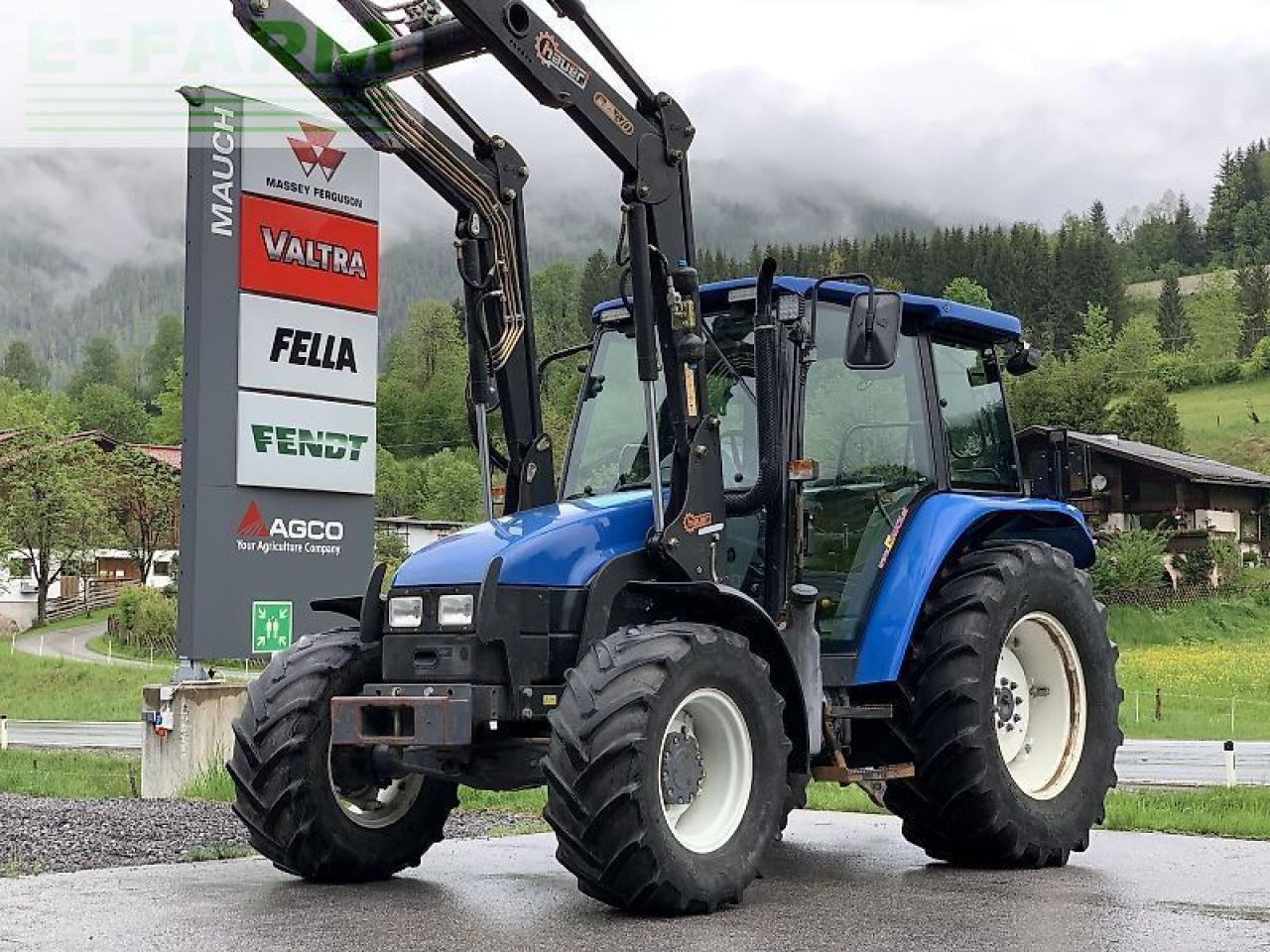 New Holland tl 70 a + hauer frontlader A - Tractor: foto 1 New Holland tl 70 a + hauer frontlader A - Tractor: foto 1