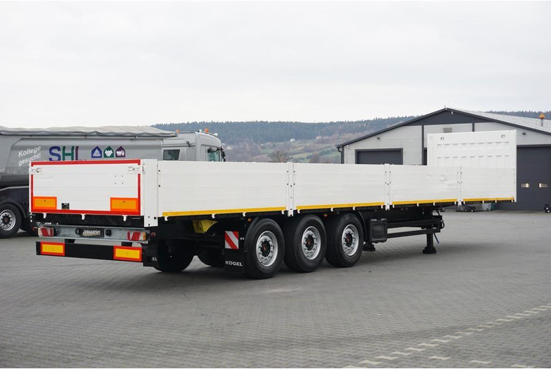 Kögel BURTOWA / BUDOWLANA / OŚ PODNOSZONA - Semirremolque plataforma/ Caja abierta: foto 5 Kögel BURTOWA / BUDOWLANA / OŚ PODNOSZONA - Semirremolque plataforma/ Caja abierta: foto 5