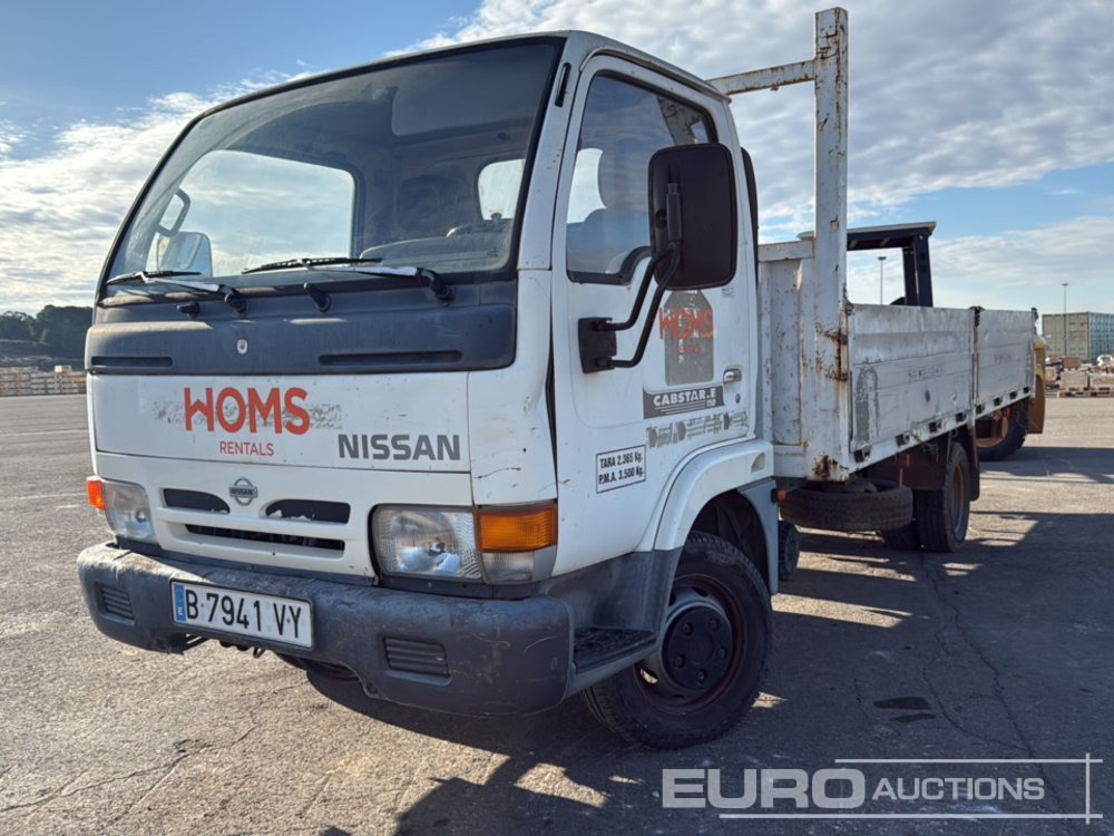 1999 Nissan Cabstar - Camión caja abierta: foto 1 1999 Nissan Cabstar - Camión caja abierta: foto 1