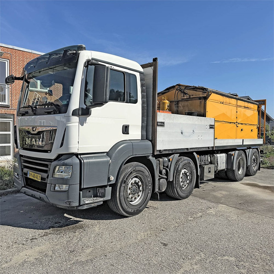 MAN TG 35. 8x2-6 BL - Camión caja abierta, Distribuidor de asfalto: foto 2 MAN TG 35. 8x2-6 BL - Camión caja abierta, Distribuidor de asfalto: foto 2