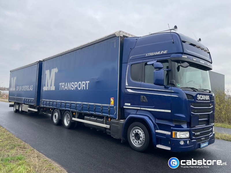 Scania R450 LB6X2MLB Euro 6 - Bouwjaar 2016 - Topline - Doorlaad-volume combi+ Wecon Middenas aanhangwagen - Good condition - Camión lona: foto 1 Scania R450 LB6X2MLB Euro 6 - Bouwjaar 2016 - Topline - Doorlaad-volume combi+ Wecon Middenas aanhangwagen - Good condition - Camión lona: foto 1