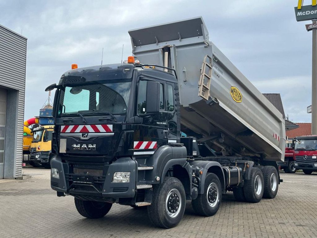 MAN TG-S 35.460 8x6 4 Achs Muldenkipper Meiller 18m³ - Camión portacontenedor de cadenas: foto 1 MAN TG-S 35.460 8x6 4 Achs Muldenkipper Meiller 18m³ - Camión portacontenedor de cadenas: foto 1